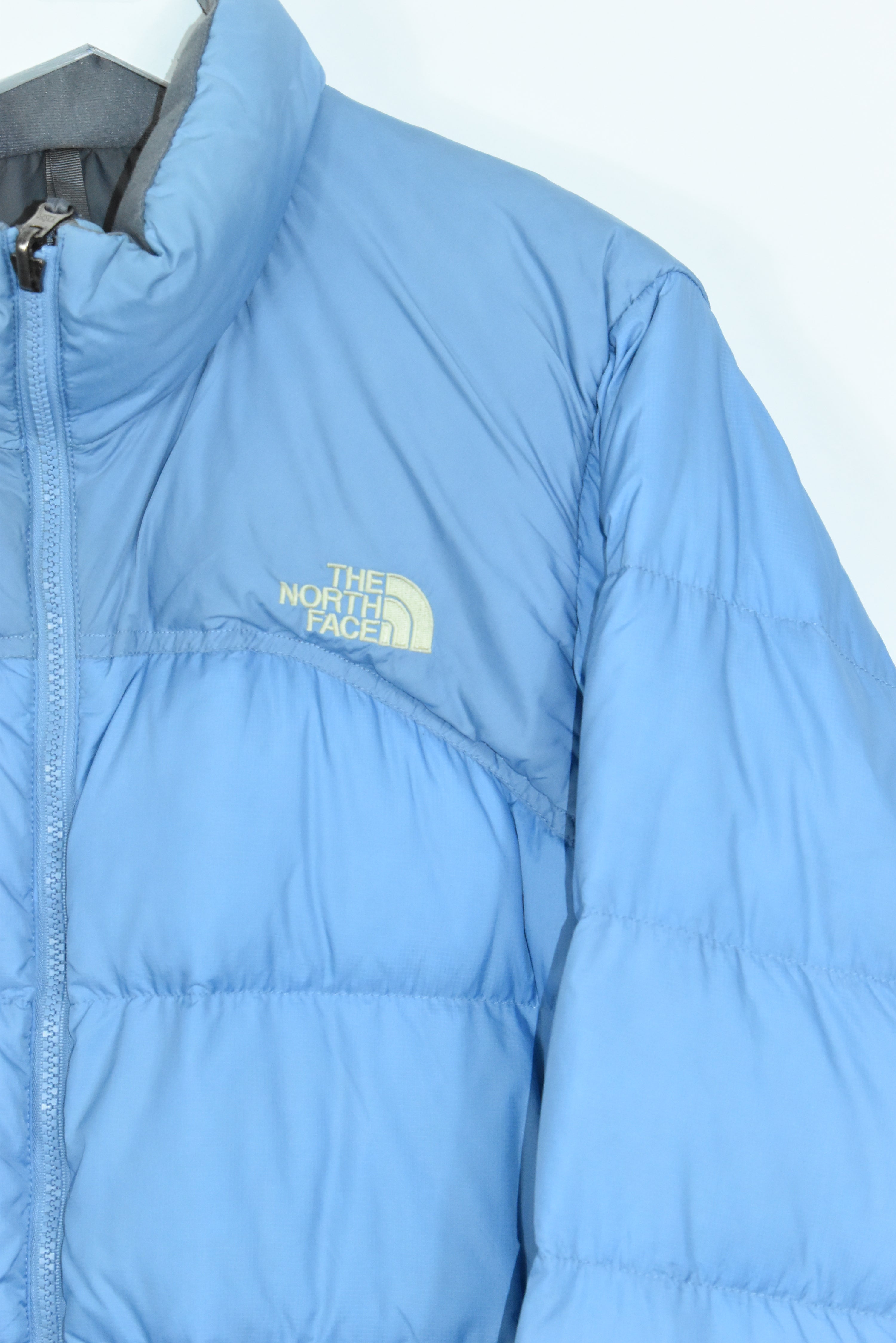 North face hotsell baby blue puffer